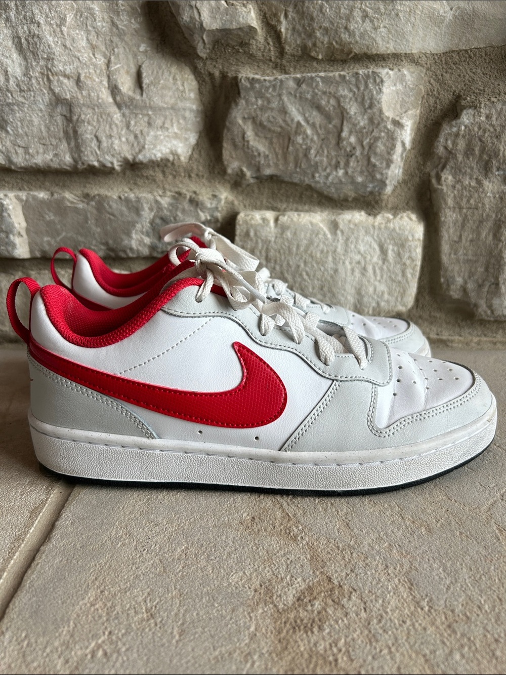 Nike Youth White Leather Low-Top Sneakers with Red Swoosh and Red Lining
